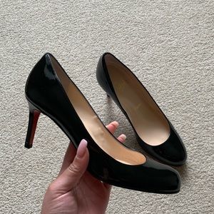 women’s christian louboutin black pumps